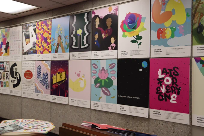 LA For All Student Art Showcase artworks hung on the Library wall for viewing. 
