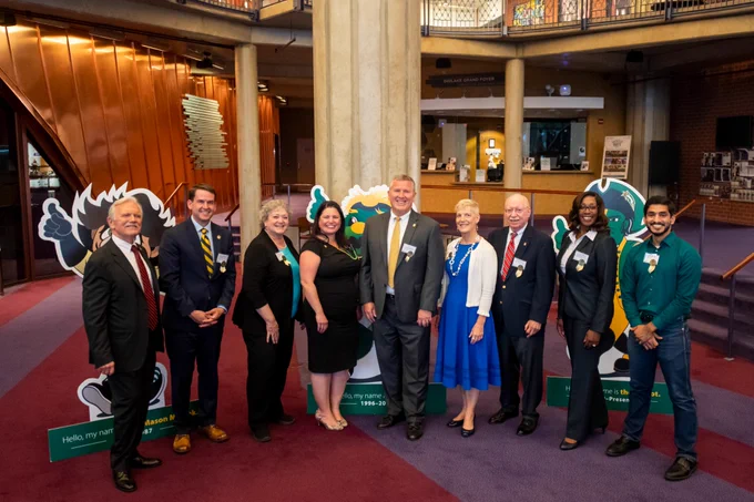 From left to right: SciTech Director of Administration and Operations Ron Carmichael with Mason alumni State Senator Jeremy McPike, Erika Spalding, Debbie Jones, Sean Connaughton, Lovey Hammel, Rex Parr, Tina Laguna, and Afnan Ali.