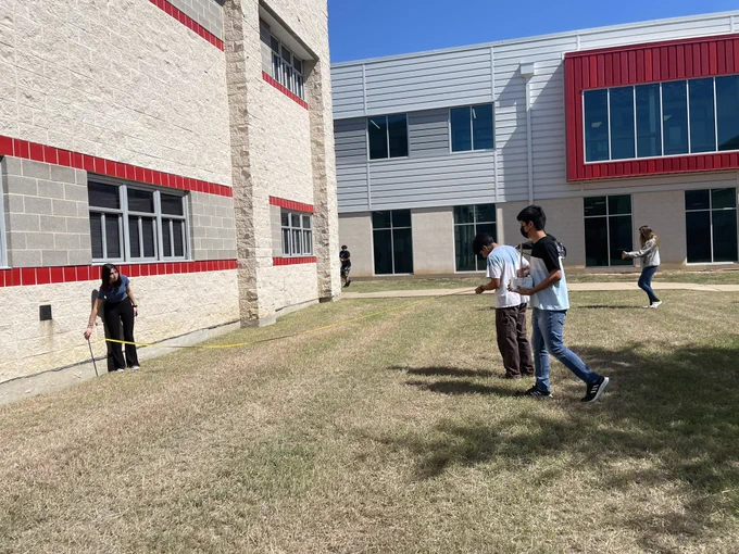 Students use pin hole cameras to capture solar images