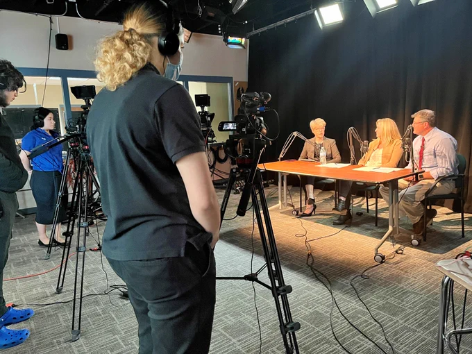 Image of Howell Cheney Technical High School Digital Media students on the set of Talking Shop with CTECS, filming the next episode. 