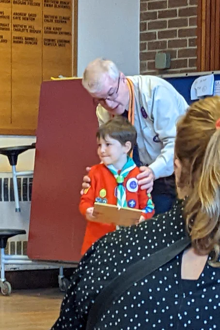 Squirrel Scout receiving certificate for Chief Scout Acorn Award 