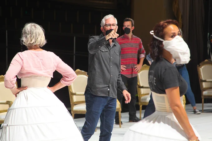Peter McClintock points during a rehearsal of "Eugene Onegin." Photo by Griner