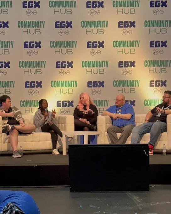 Myself and the four people tagged sitting on stage talking about ADHD, Autism and gaming