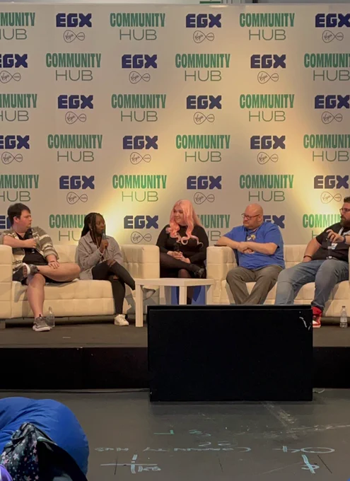 Myself and the four people tagged sitting on stage talking about ADHD, Autism and gaming