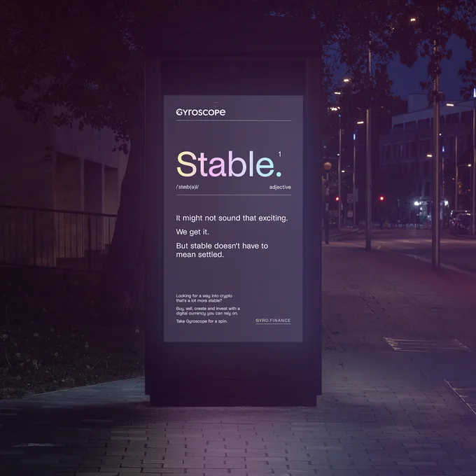 An advert for Gyroscope on a screen on a city street.