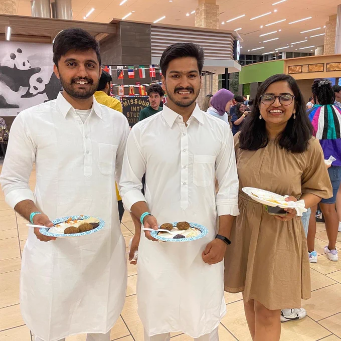 Group of people with plates.