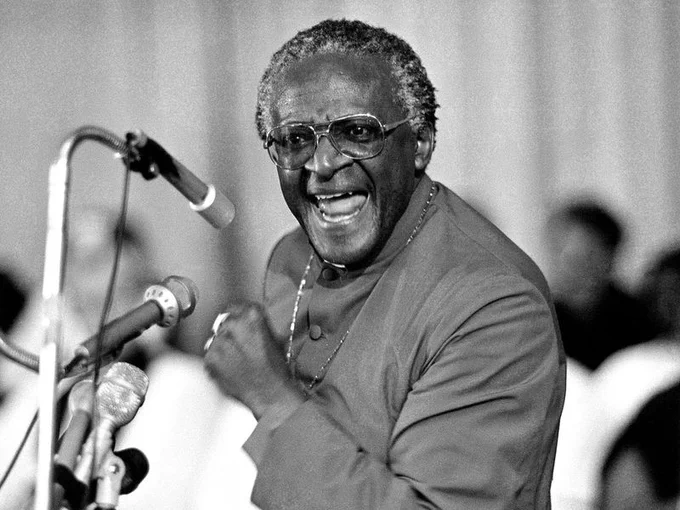 Archbishop Desmond Tutu speaking at a rally 