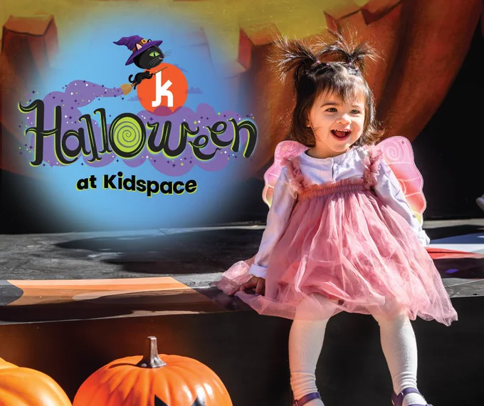 Child in costume on Halloween stage