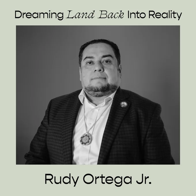A black and white portrait against a pale green background with black text that says, "Dreaming Land Back Into Reality. Rudy Ortega Jr."
