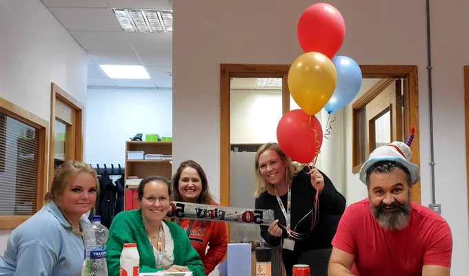 Photo of some of the Access team with the David Hodge who is celebrating his 50th birthday