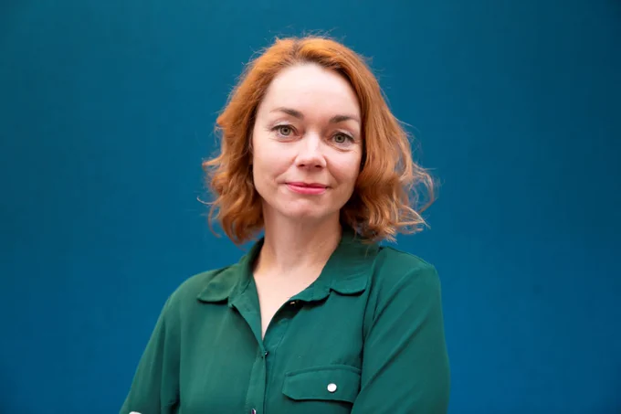 The image is a photograph of Sarah Crafter