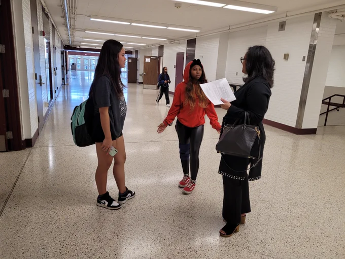 Stephanie Burrage speaking with students