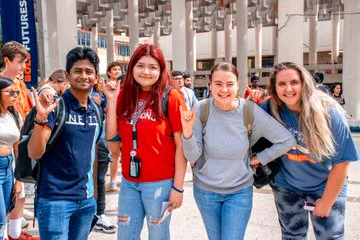 Roadrunner Productions members smile at the camera during the first Game Week Wednesday on campus. 