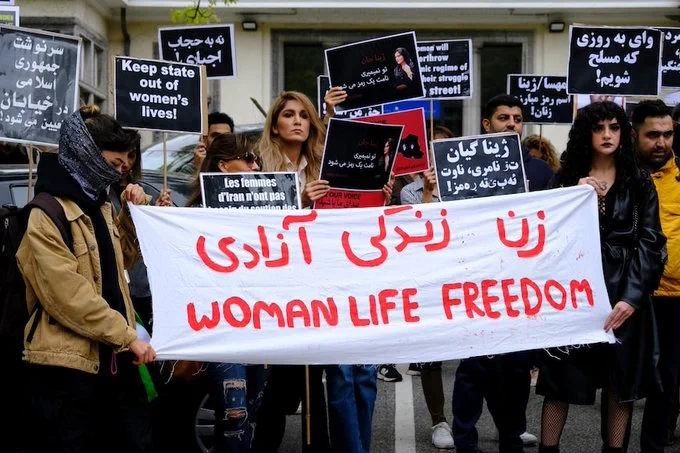 Protesters show solidarity with Iranian women and protesters in Iran, Belgium, September 2022.