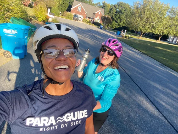 Jennifer and Janice are smiling and taking a selfie out with the tandem