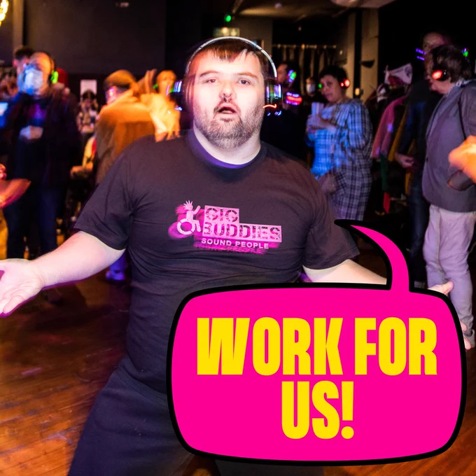 Man in night club saying "work for us"