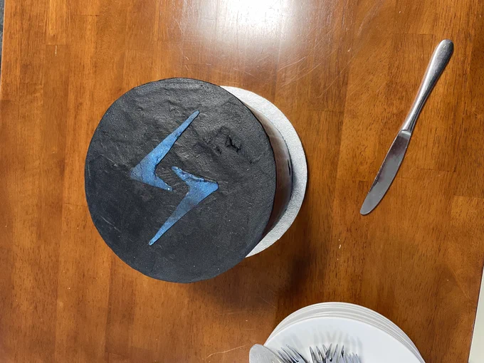 Delicious chocolate cake with a Slint logo