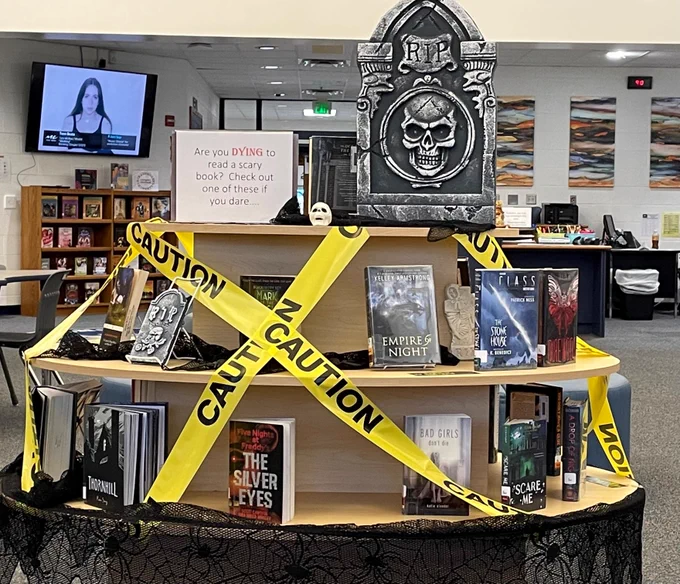 Book Display with thrillers and Halloween decorations 