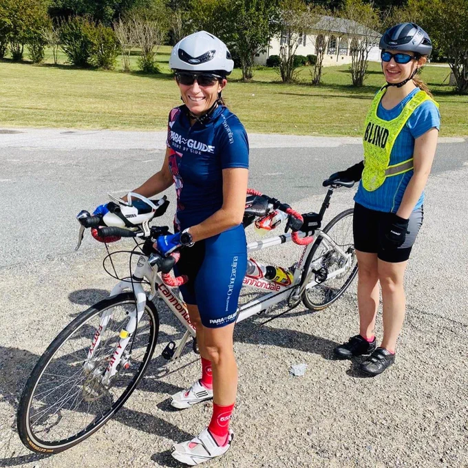 The team with the tandem bike after the ride