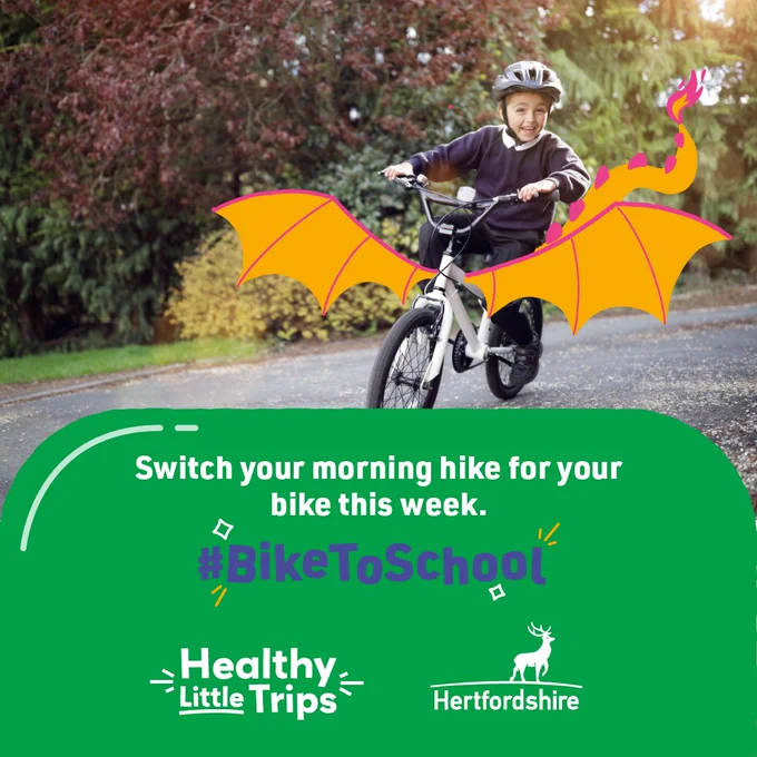 Boy on his bike with drawn wings and tail