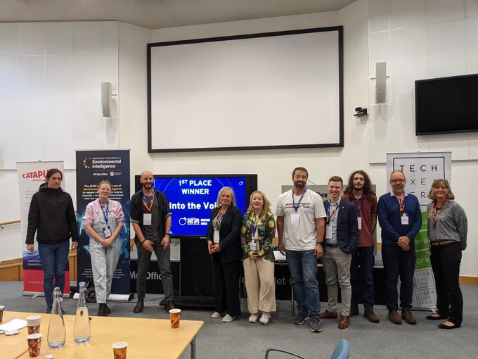 Photo of the winning team with the judges