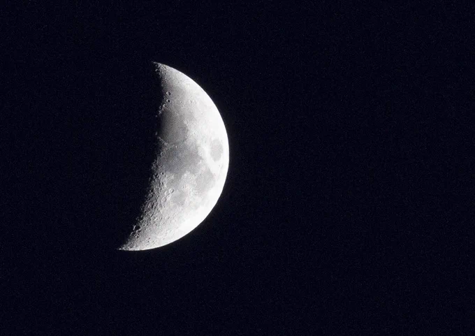 The moon as photographer through a 70-200mm lens on Saturday night.