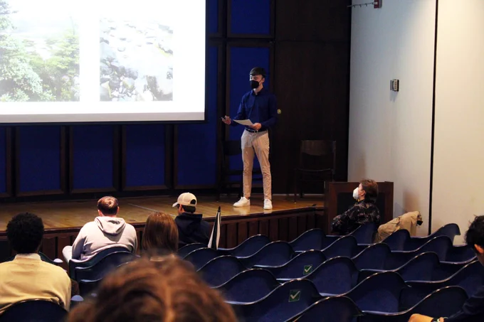 A W&M student giving a presentation on his research project.