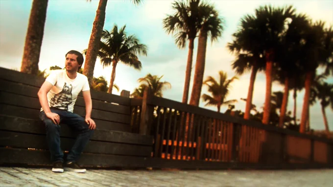 Kevin Werdelmann sitting on a bench at Bowditch Point Park