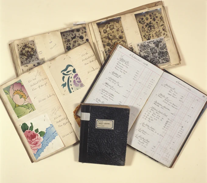 photograph album showing Silver Studio designs and other associated sales records, 1890s