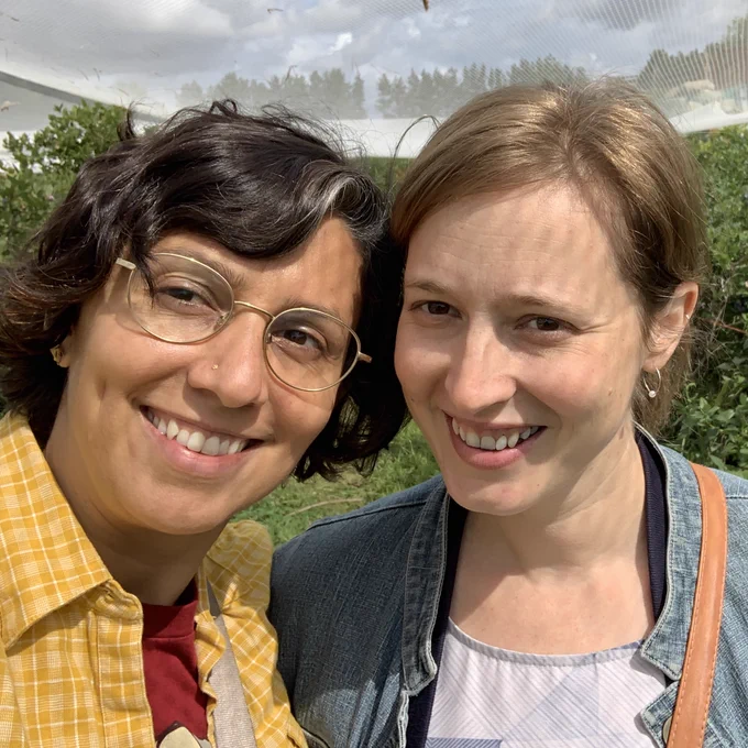 Nadia and Krista in a blueberry field