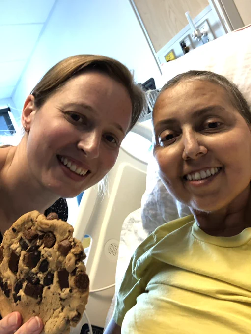 Krista and Nadia enjoying a chocolate chip cookie at the hospital