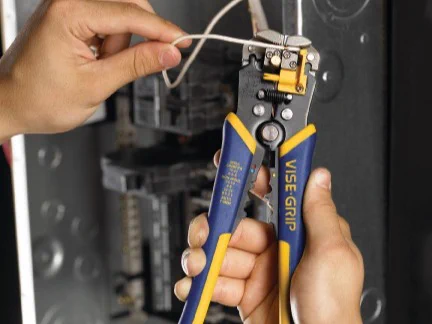 An image of someone using a Vise-Grip® Wire Stripper.