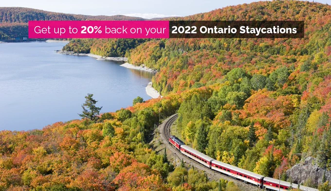 Aerial view of the Algoma train riding through forested area in autumn colours.
Get up to 20% back on your 2022 Ontario Staycations.