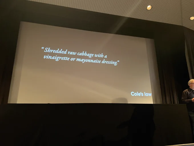 A slide with a quote that reads “shredded raw cabbage with a vinaigrette or mayonnaise dressing” attributed to “Cole’s Law”