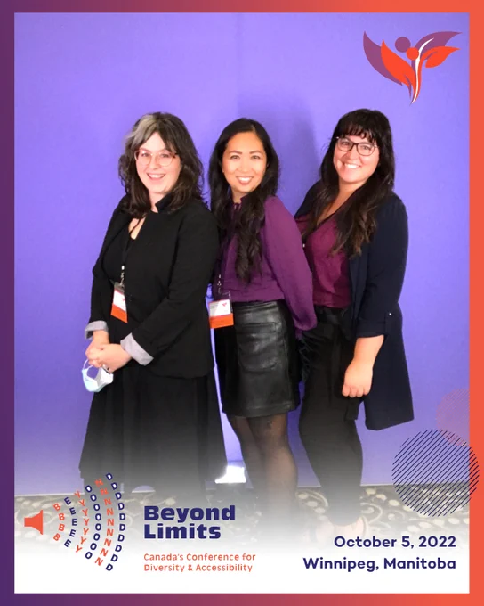 Michelle Everton, Kristina Kircher, and Kellie Lambert posing in the photo booth. 