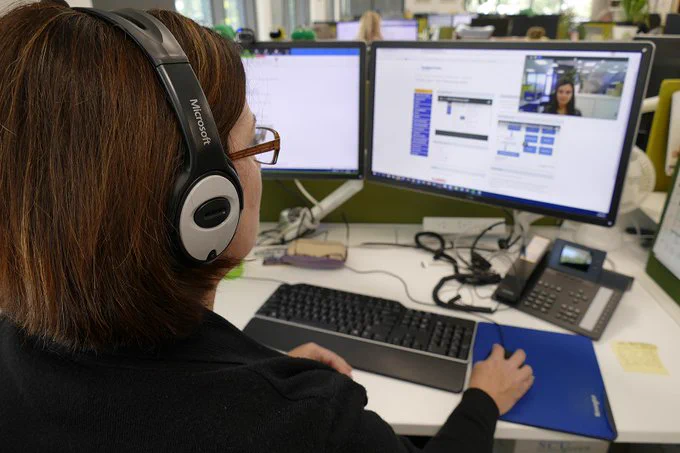 Women sitting at a computer