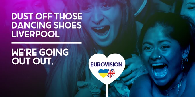 A graphic images of two people in a crown screaming. 'dust off those dancing shoes Liverpool, we're going out out' is written in white.