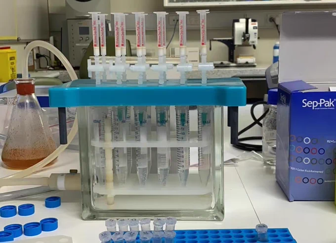 The setup of solid phase extraction manifold with Sep-Pak tC18 cartridge.