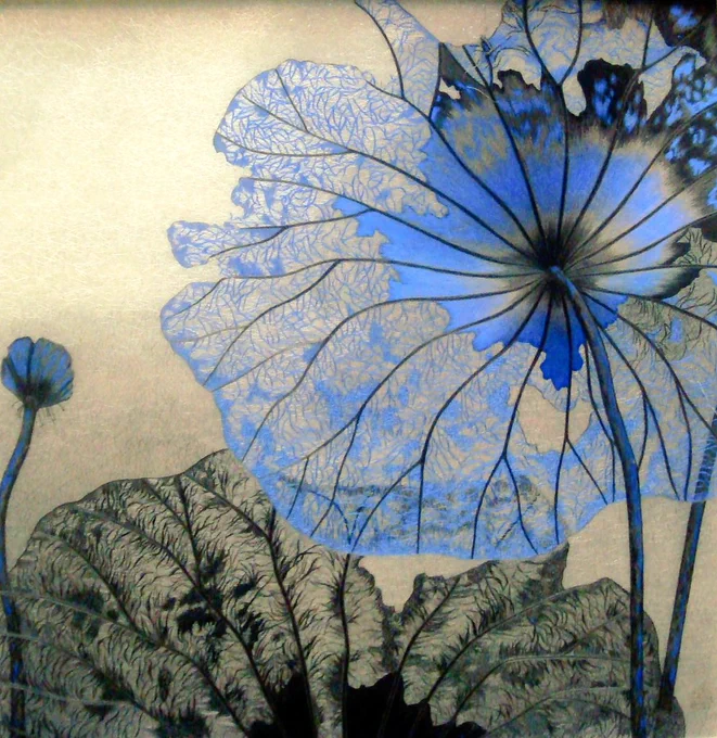 Embroidered blue flower on a gold background 