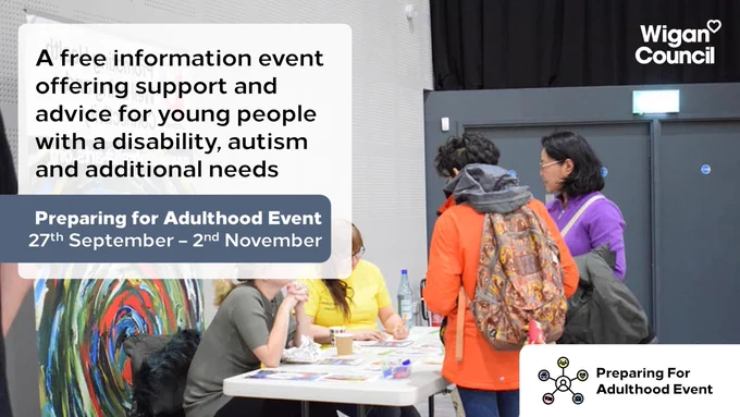 Young people getting information from some professionals at a stall at a previous event