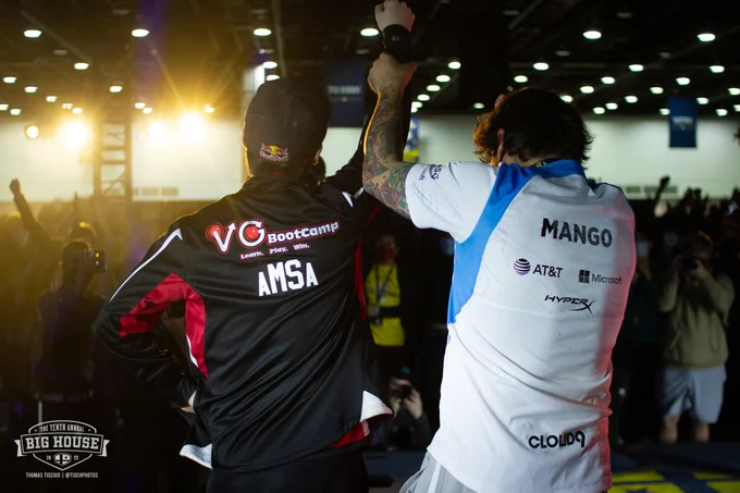 Mang0 holding up aMSa's hand after aMSa's victory at The Big House 10.