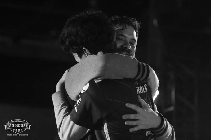 Liquid Riddles and his teammate Hungrybox hugging after Riddles win at the Big House 10. 