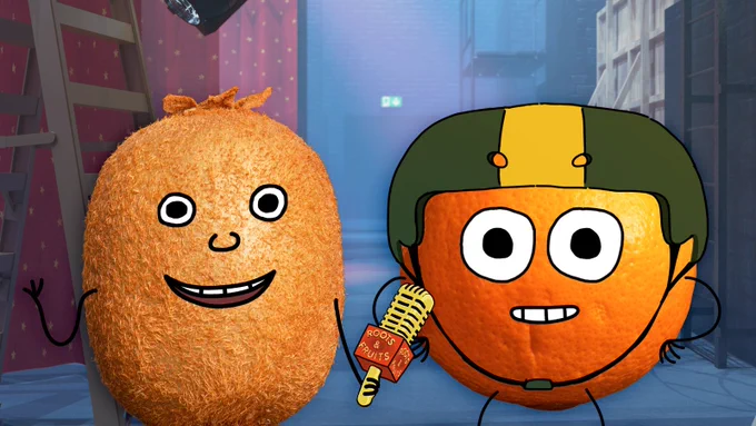 A kiwi fruit with an animated mouth, nose and eyes interviews an orange with a helmet on.
