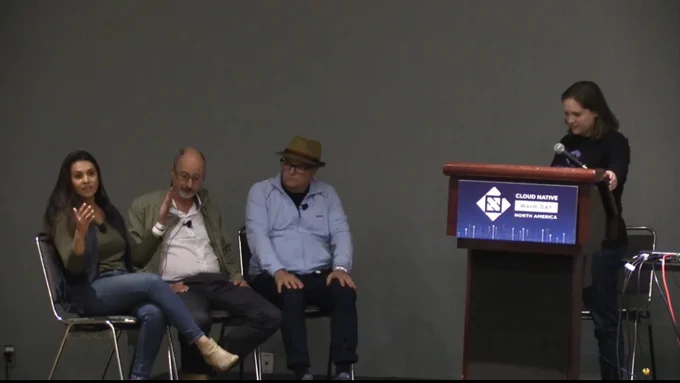 Renee Shah (Amplify Partners) with Michael Azoff (Omdia), Alex William (The New Stack) on-stage at the panel discussion at Cloud Native Wasm Day North America, moderated by Bailey Hayes (Cosmonic).