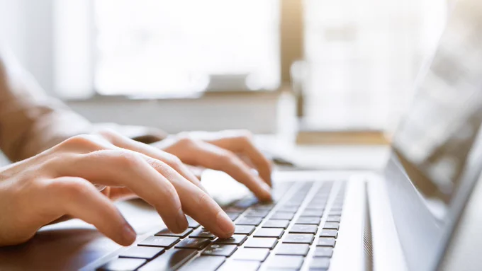 An image of someone using a laptop