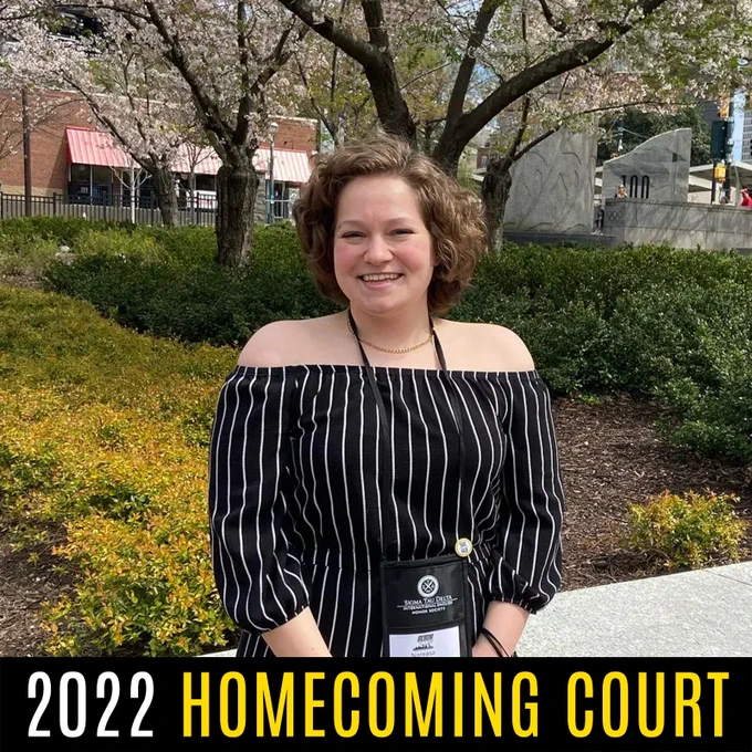 [ID: Photo of Nora. Across the bottom on a black border: “2022 Homecoming Court.” End ID]