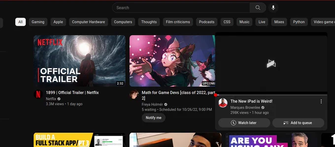 YouTube front page with new design, its more modern, corners are rounded. It looks slick.