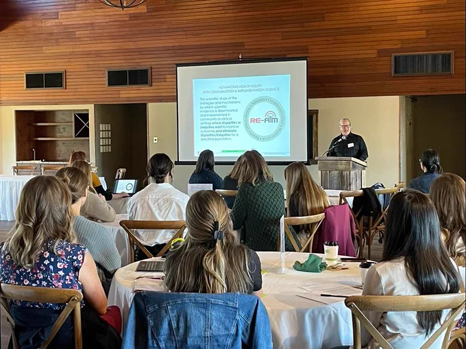 The Center for Dissemination and Implementation sponsored the D&I Rural Health Symposium, a collaborative event bringing together over 45 regional stakeholders. Featured here is keynote Paul Estabrooks, PhD, Professor at the University of Utah. 