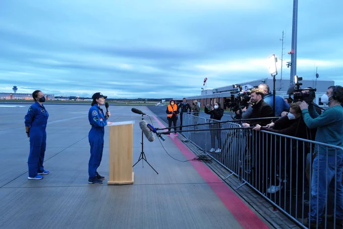 Samantha addresses the gathered press, friends and family after arriving in Cologne