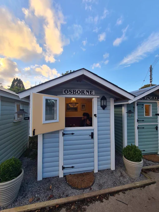 Little beach hut in a pub garden, very cosy, with a chanedlier